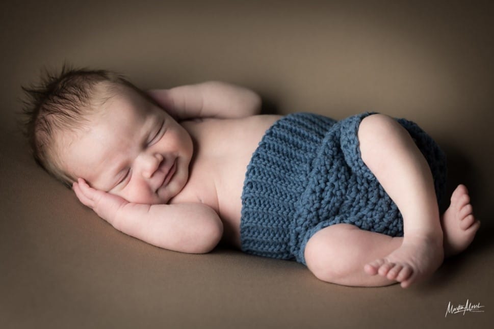 Photographie d'un bébé faite par Martin Morel professionnel de la photographie